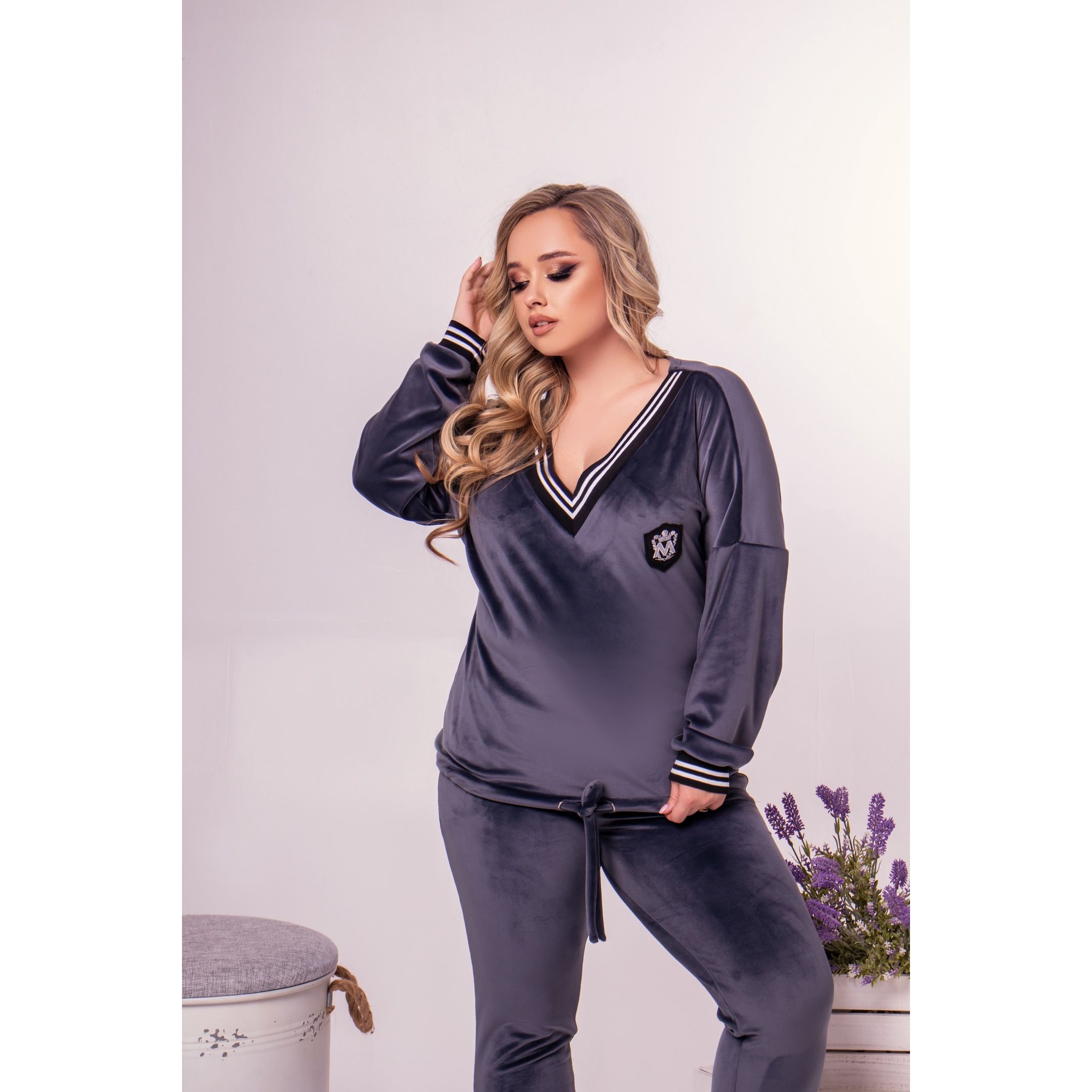 Як підібрати якісні жіночі спортивні костюми великих розмірів